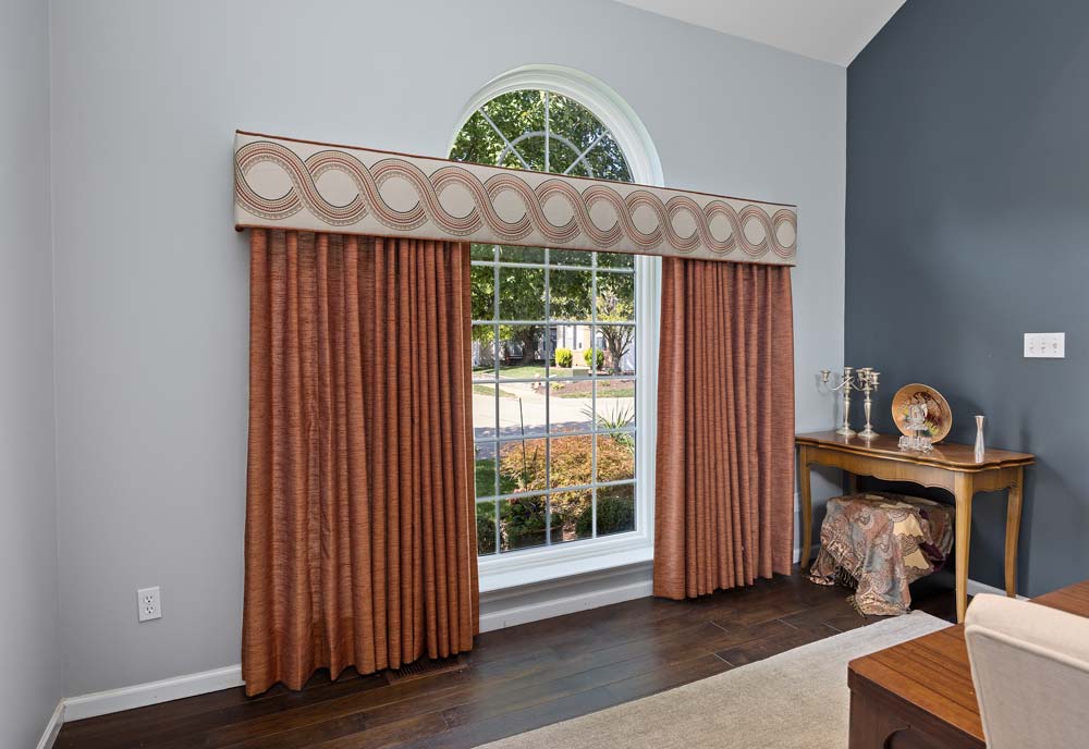 Office Window Treatment With Pleated Drapery Panels and Cornice