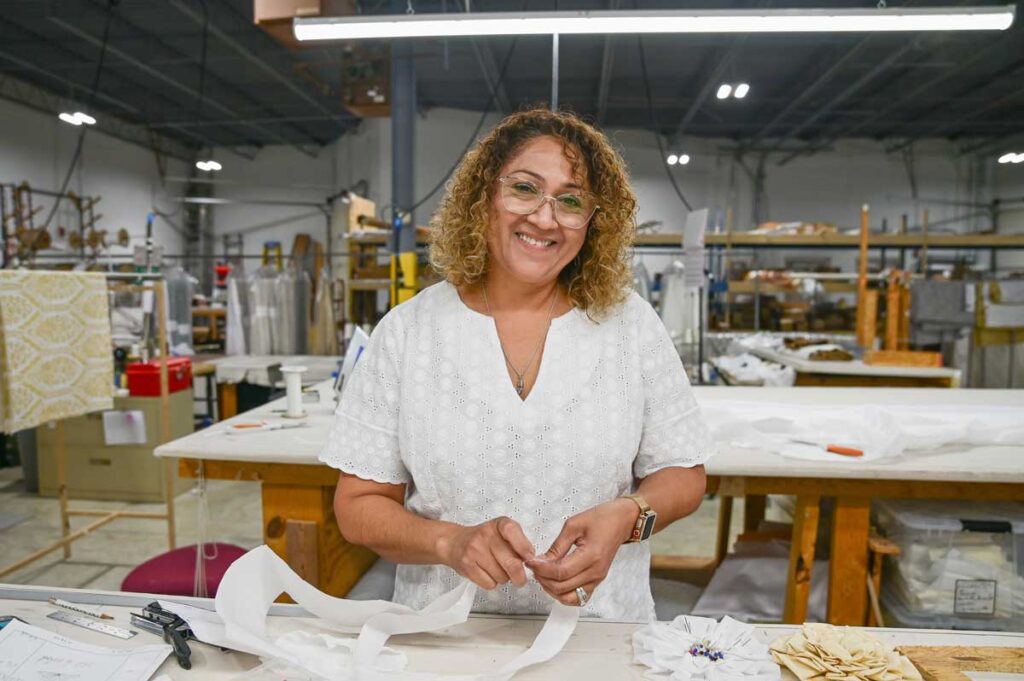 Portrait image of seamstress Leila at Sunshine drapery in the St Louis workroom