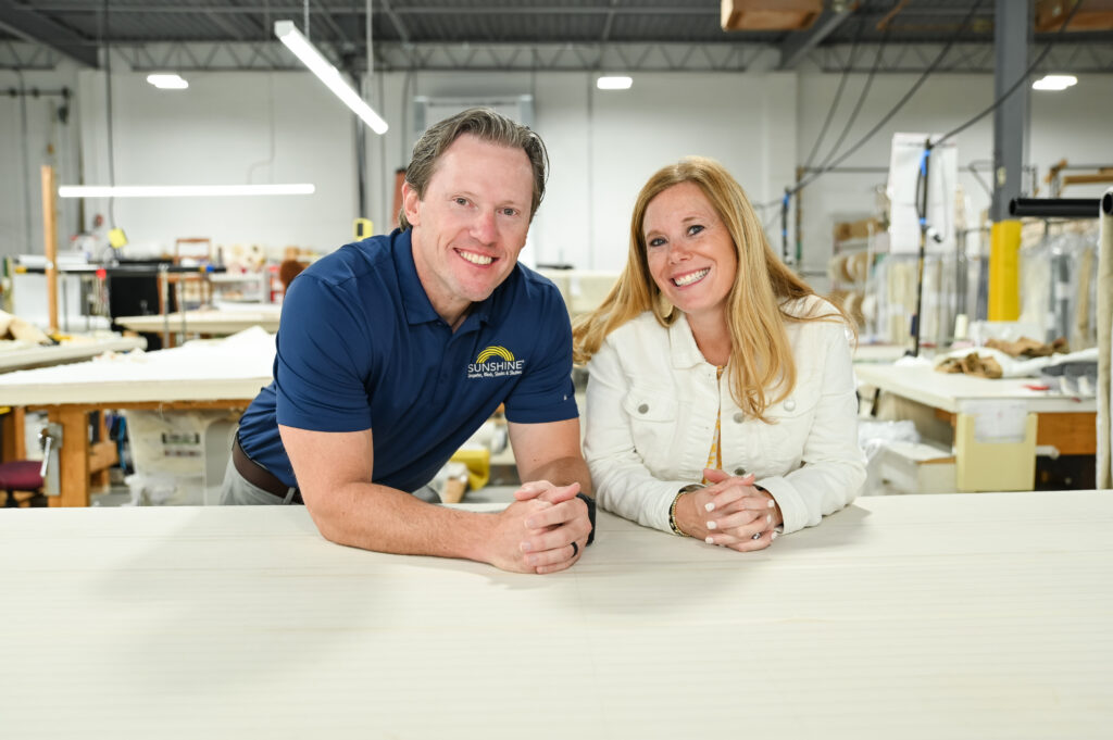 A Landscape photo of Sunshine Draperies, Blinds, Shades, and Shutters owners Jason & Taira Price.